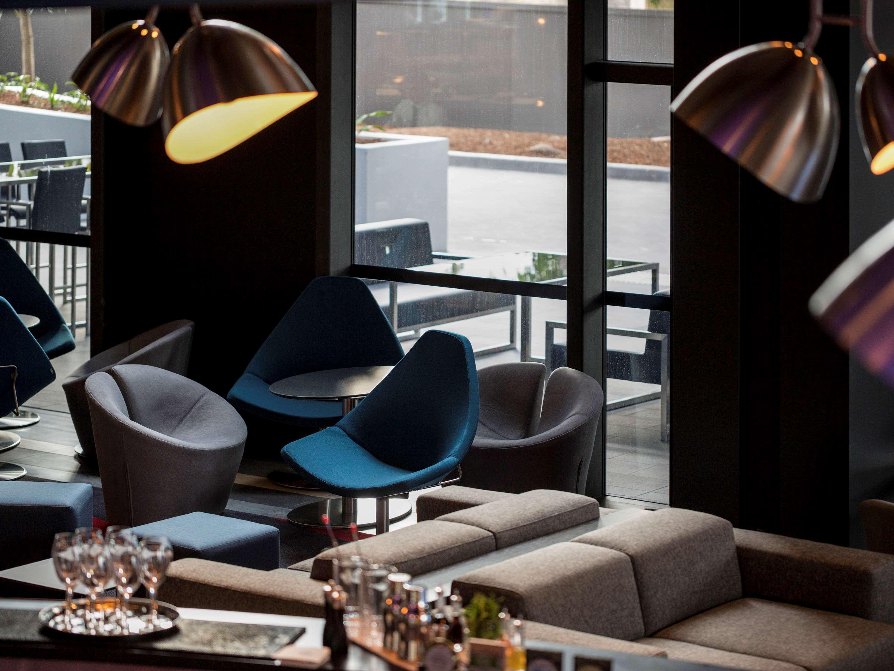พูลแมน ซิดนีย์ แอร์พอร์ต Hotel ภายนอก รูปภาพ The interior of the lounge